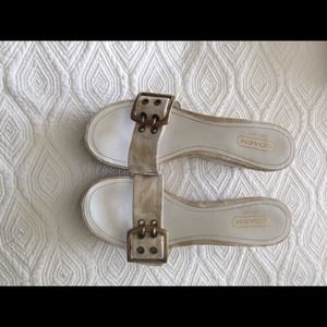 Coach white wedges with gold accents and detail.