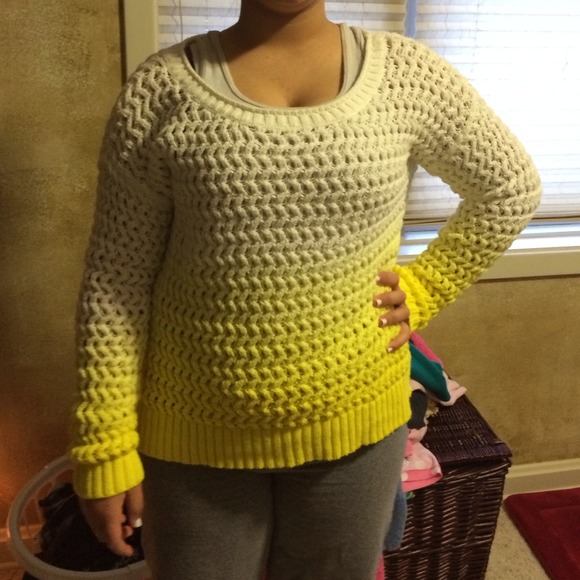 Whit an yellow sweater