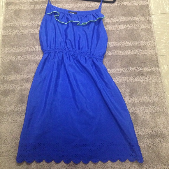 Royal blue summer dress with green accent.