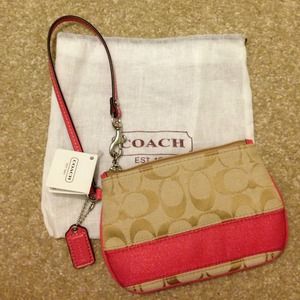 Coach light khaki/coral wristlet