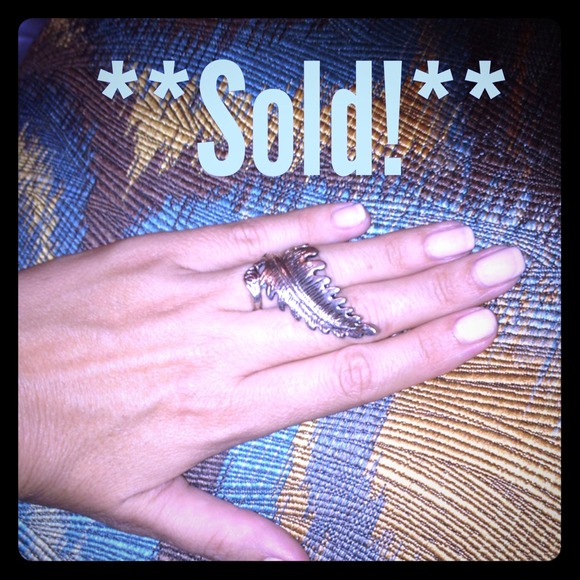**Sold!** Very cool! Metal Feather Ring