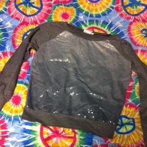 Over sized sparkly shirt.