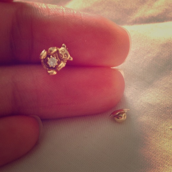 14k one single baby earrings ..real diamond .