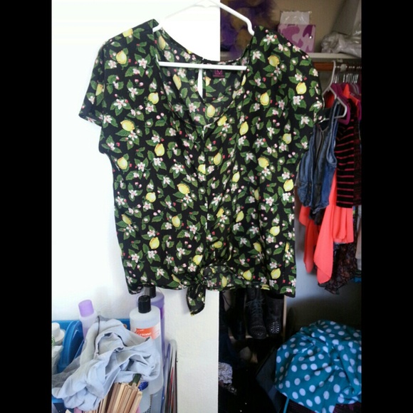 Somewhat of a crop top ties at the bottom