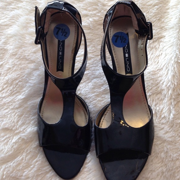 Black leather shoes by Bandolino.  Never worn.