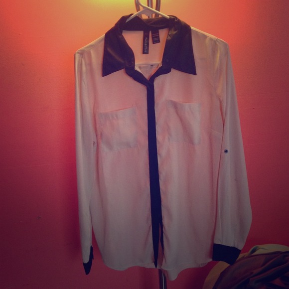White top with black accents
