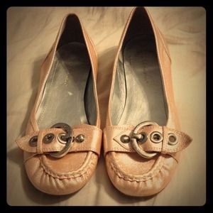 Pink buckled flats