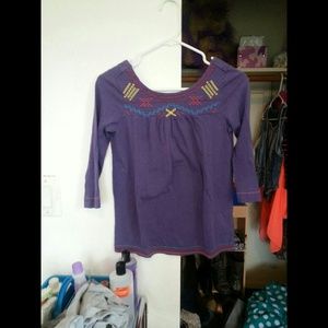 Size xs small but fits up to a medium.