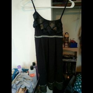 Dress or tank dress. Depending on height.