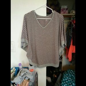 Red and gray stripe batwing top.