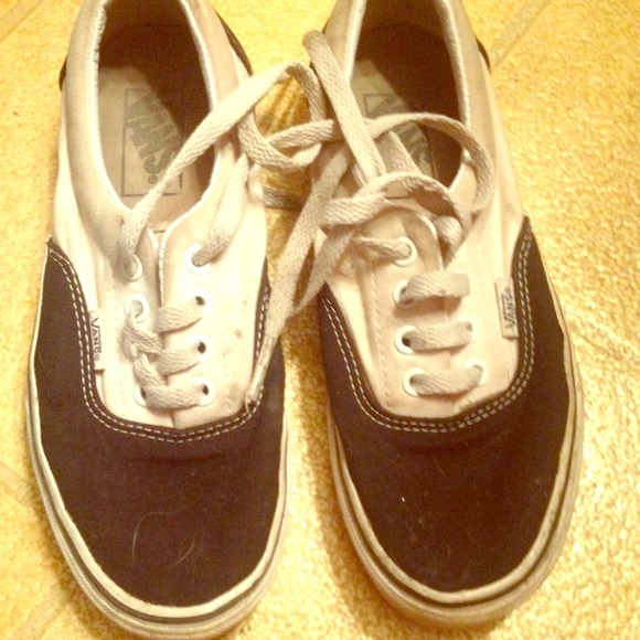 Black and white Vans. Size 5 in mens