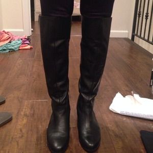 Gorgeous black leather boots with silver zipper