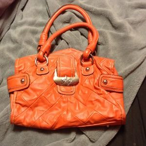 Small orange guess purse