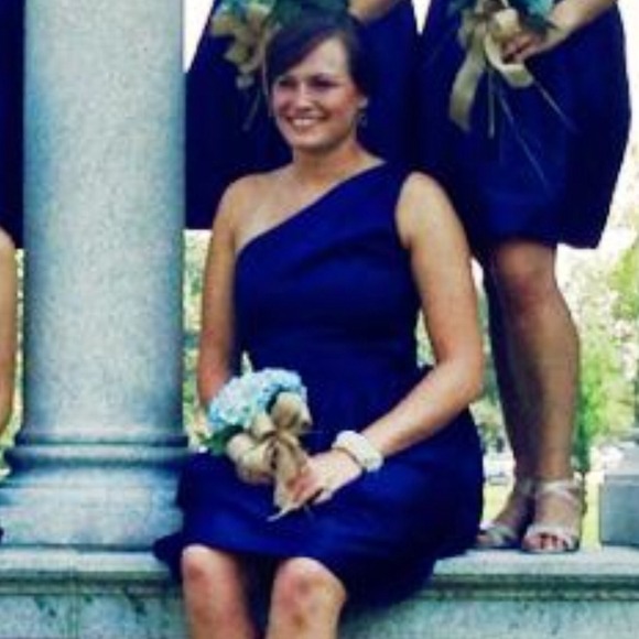 One shoulder navy bridesmaid dress.