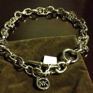 NEW! Michael Kors silver necklace. Price Firm