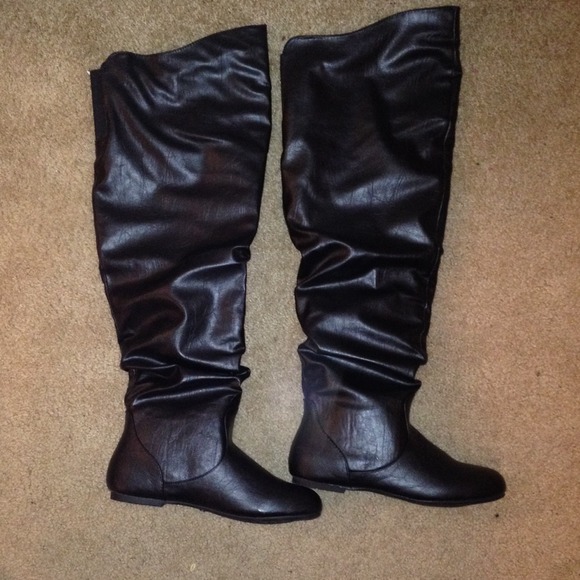 Black leather knee high boots