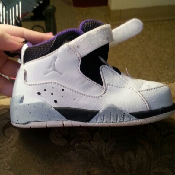 white and purple Jordan's 8c