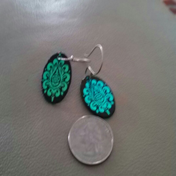 One pair oval paisley earrings