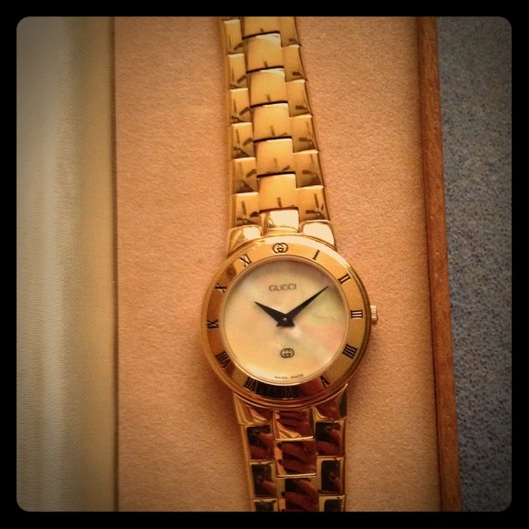 Gold and Opal Gucci Watch