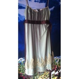 Sequined/beaded brown, green, and gold dress.