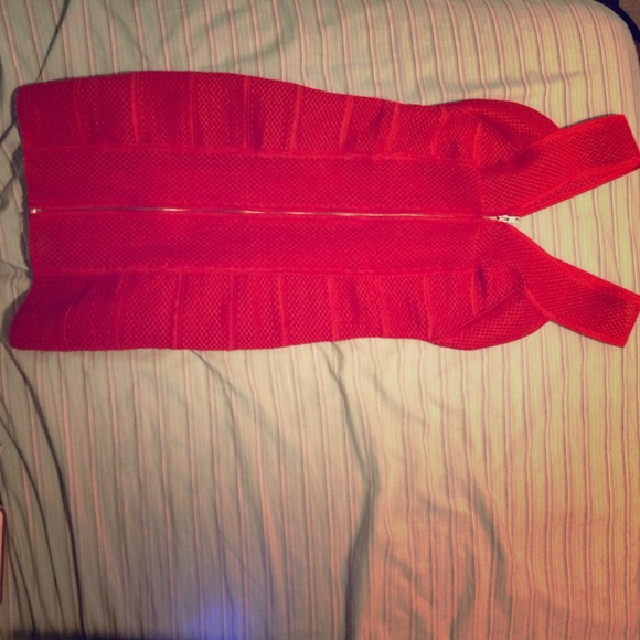 Red form fitting bandage dress