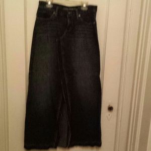 Long denim DKNY jean skirt with a front split