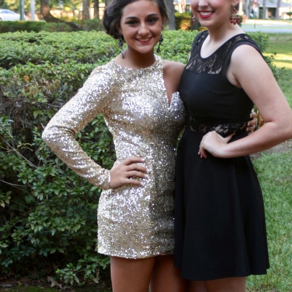 Gold sequined one sleeved homecoming dress