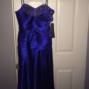 Long sapphire blue dress bust covered in gems