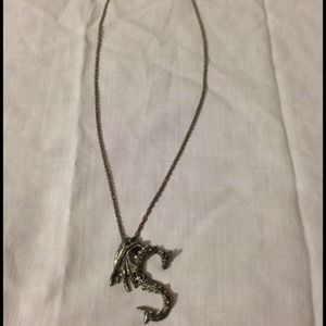 Silver dragon with necklace