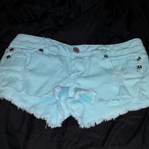 Bejeweled sky blue distressed short shorts