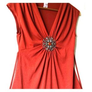 Emblem inspired sleeveless shirt.