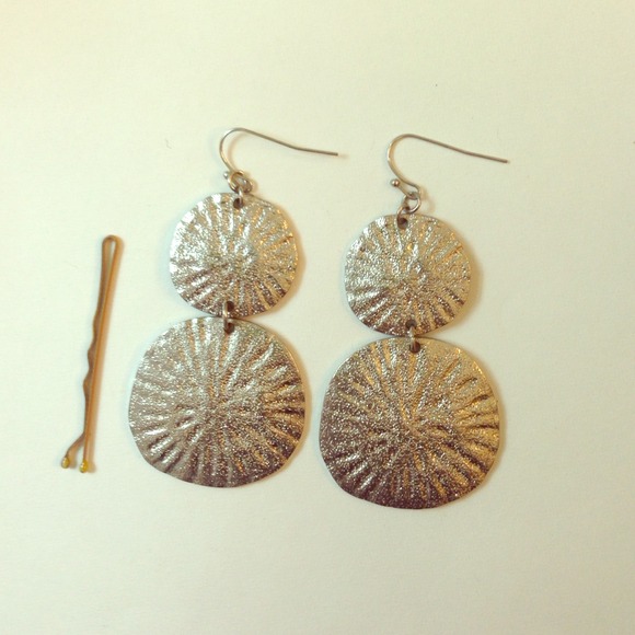 Silver tone sand dollar earrings