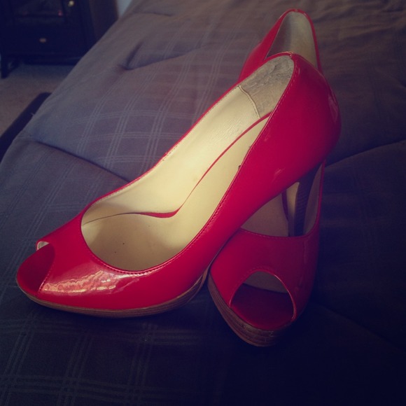 REDUCED!!!  Red peep toe pumps.