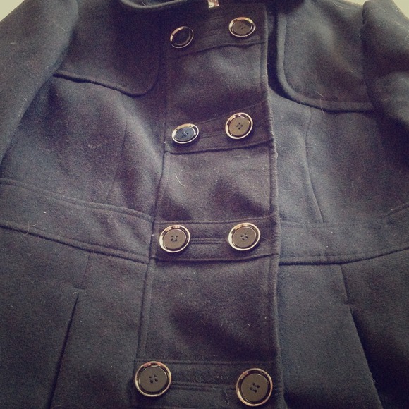 A black hydraulic coat