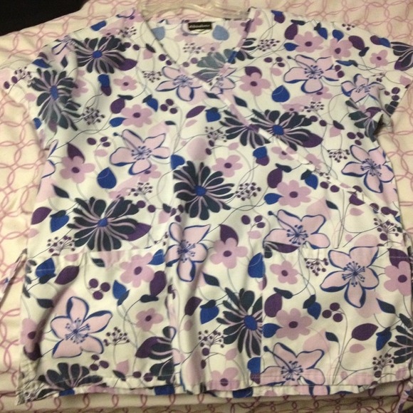 Purple flowered scrub top