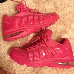 Hot Pink Nike Air tennis shoes.