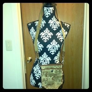 Coach Signature Swing