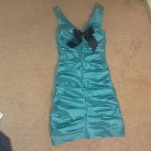 Teal stretch dress, vintage with black bow.
