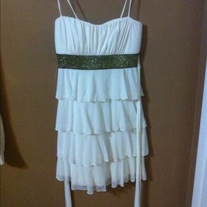 White silky dress with gold sash