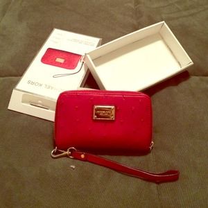 Michael kors red leather wallet.