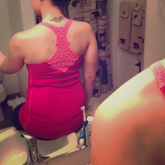 Pink tank top with flower design on back