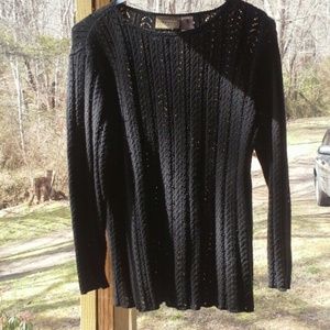 Beautiful black upscale top that gives a feminine