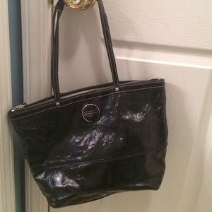 Coach black patent leather tote style purse.