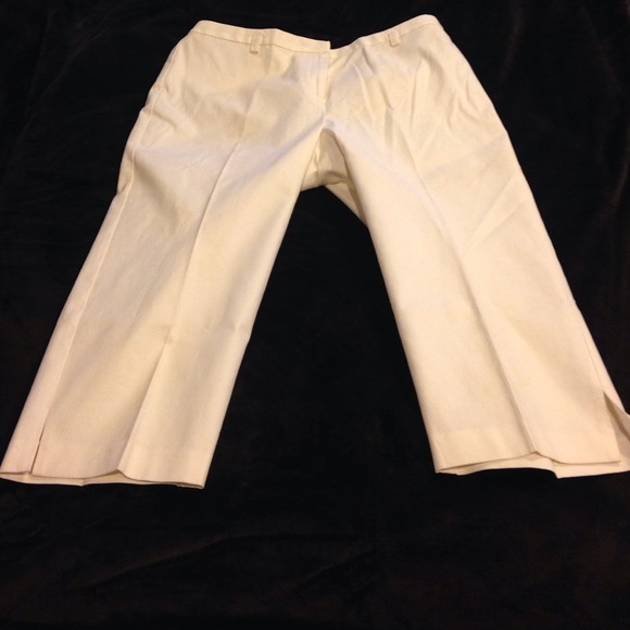 Cream colored capri pants with subtle print.