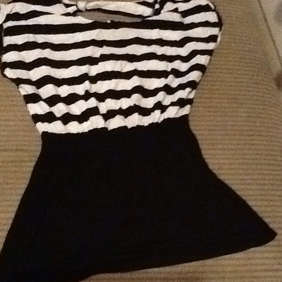 A dress I think you can wear it as a shirt too!!