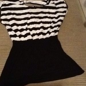 A dress I think you can wear it as a shirt too!!