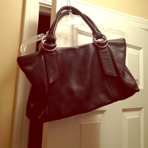 Express black genuine leather purse.