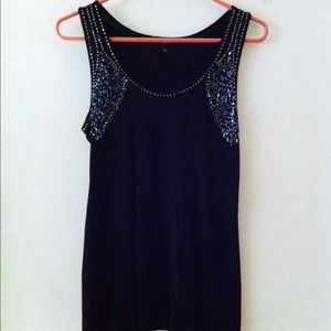 NWOT tag. Black sequin tank