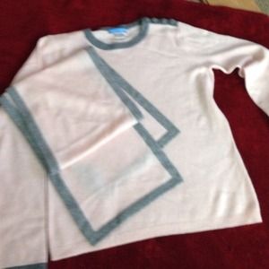 Precious pale pink cashmere sweater and scarf set.