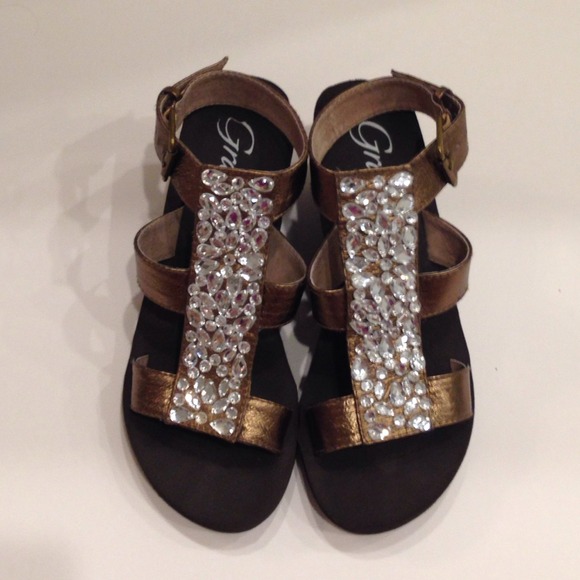 Bronze crystal embellished gladiator wedges.